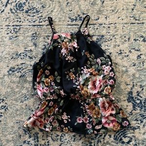 Francesca’s black and floral blouse